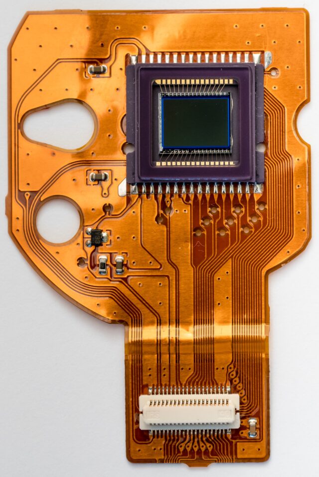image of microchip on orange board