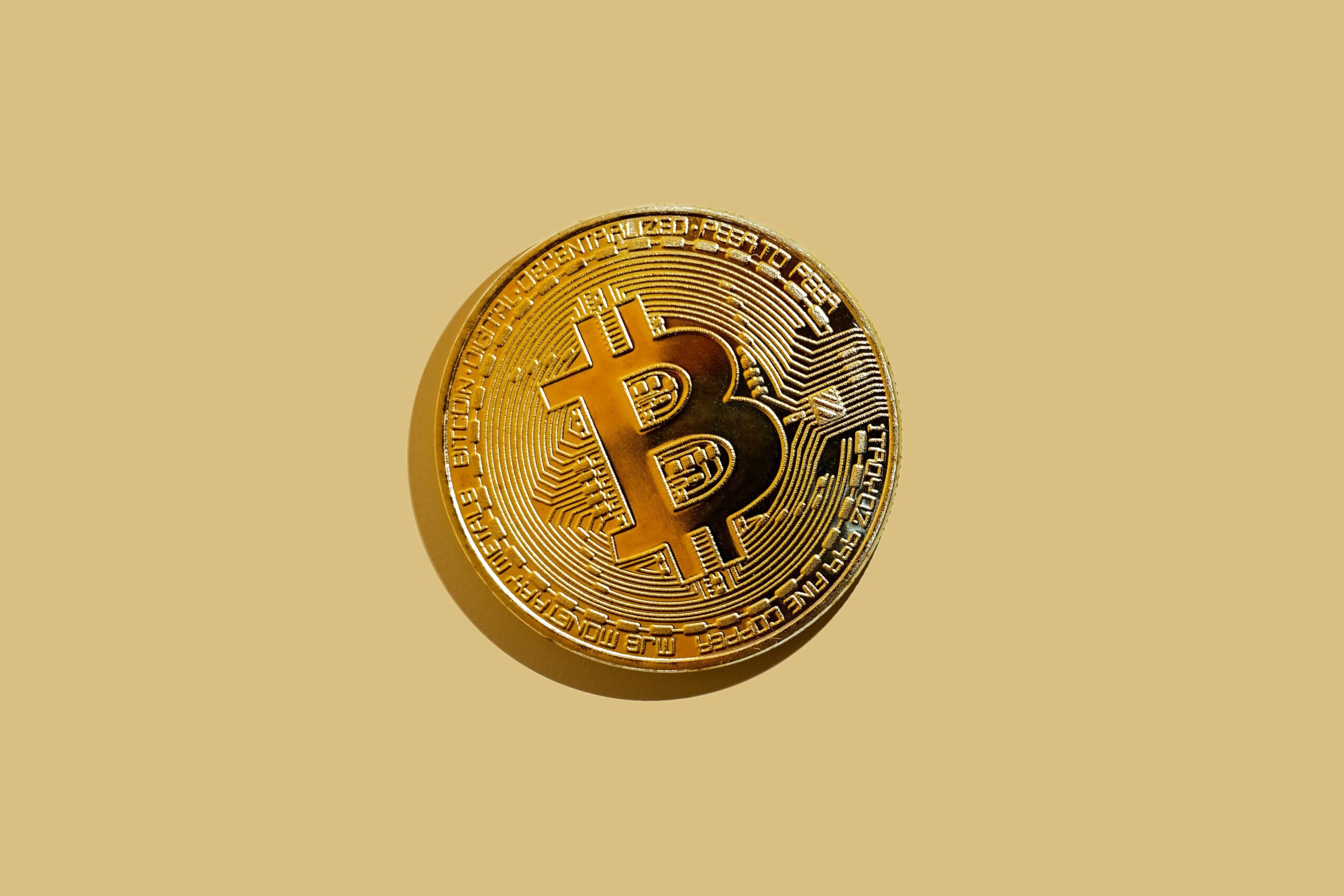 image of physical depiction of a bitcoin (gold coin)